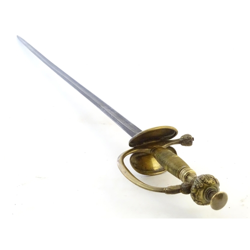 992A - Militaria: a late 19thC Prussian civil service Epee court sword, the brass hilt with ovoid wire-wrap... 