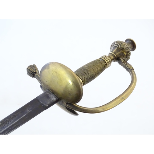 992A - Militaria: a late 19thC Prussian civil service Epee court sword, the brass hilt with ovoid wire-wrap... 