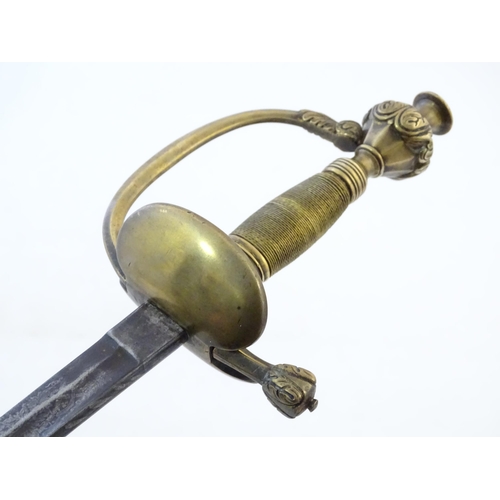 992A - Militaria: a late 19thC Prussian civil service Epee court sword, the brass hilt with ovoid wire-wrap... 