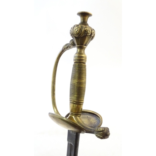 992A - Militaria: a late 19thC Prussian civil service Epee court sword, the brass hilt with ovoid wire-wrap... 