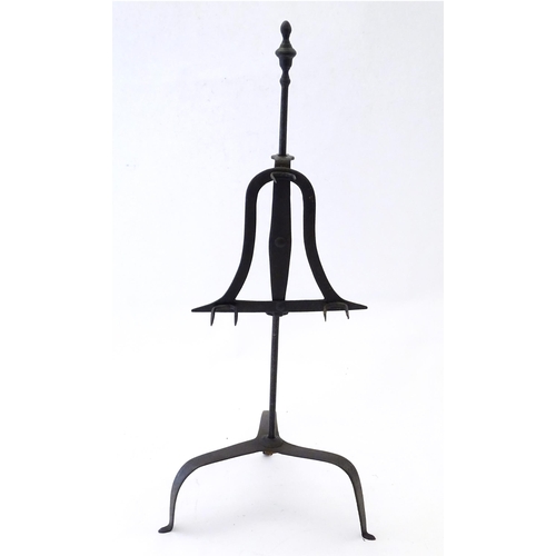 2088 - A 19thC fireside lark spit meat roasting stand, of hand forged wrought iron construction, having a r... 