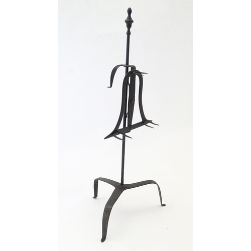 2088 - A 19thC fireside lark spit meat roasting stand, of hand forged wrought iron construction, having a r... 