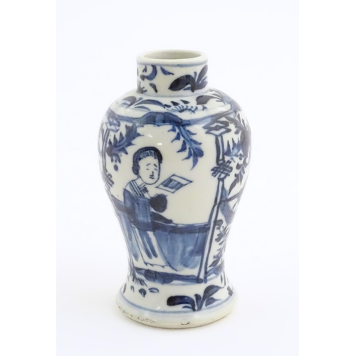 18 - A small Chinese blue and white vase decorated with figures on a garden terrace with flowers and bird... 