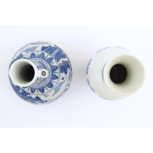 23 - A Chinese blue and white arrow vase with twin handles to neck, the body decorated with landscape sce... 