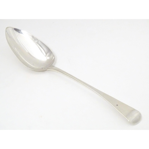 426 - A George III silver Old English pattern table spoon, hallmarked London 1811, maker John Lambe. Appro... 