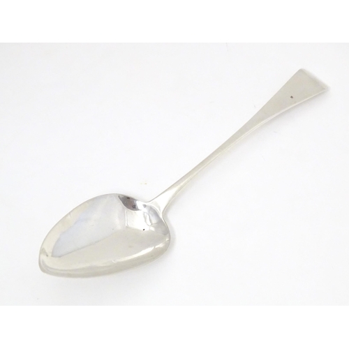 426 - A George III silver Old English pattern table spoon, hallmarked London 1811, maker John Lambe. Appro... 