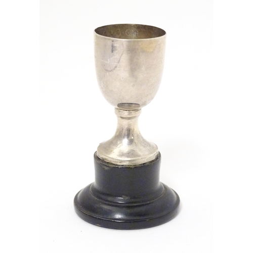 432 - A small silver trophy cup on socle base, hallmarked Birmingham 1936, maker Marson & Jones. Approx. 2... 