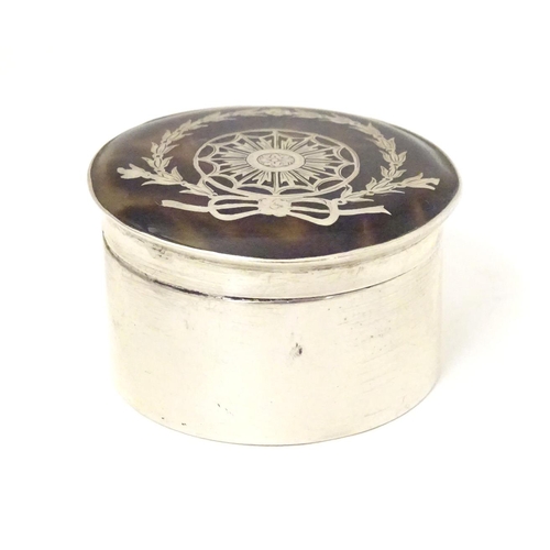 438 - A silver pill box with tortoiseshell pique work detail to lid, hallmarked Birmingham 1902, maker Cri... 