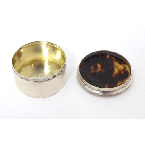 438 - A silver pill box with tortoiseshell pique work detail to lid, hallmarked Birmingham 1902, maker Cri... 