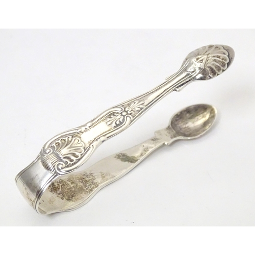 439 - Victorian silver Queens pattern sugar tongs hallmarked London 1843, maker William Eaton. Approx. 4