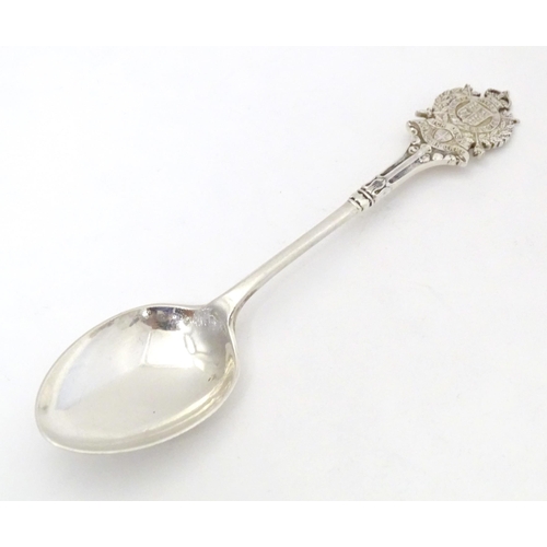 451 - A silver teaspoon the handle surmounted by crest for London Rifle Brigade, hallmarked Sheffield 1909... 