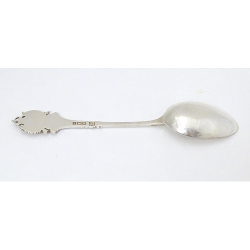 451 - A silver teaspoon the handle surmounted by crest for London Rifle Brigade, hallmarked Sheffield 1909... 