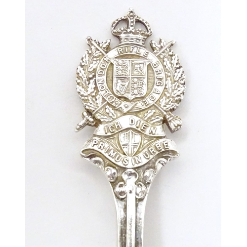 451 - A silver teaspoon the handle surmounted by crest for London Rifle Brigade, hallmarked Sheffield 1909... 