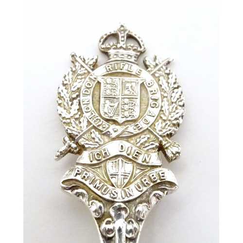 451 - A silver teaspoon the handle surmounted by crest for London Rifle Brigade, hallmarked Sheffield 1909... 