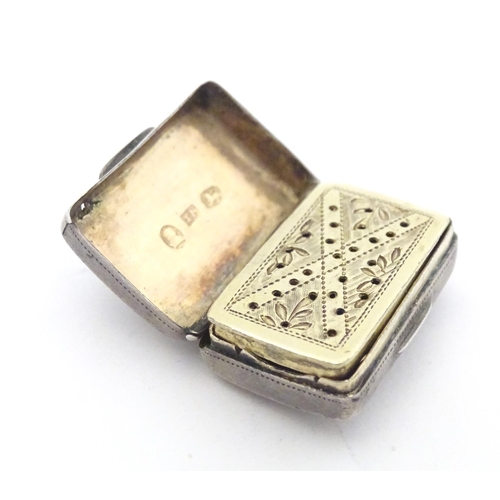 457 - A Geo IV silver vinaigrette opening to reveal a gilded interior and pierced grille, hallmarked Birmi... 