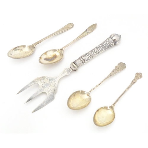 459 - Four assorted silver teaspoons, together with a silver handled fork. Largest approx. 6 1/2