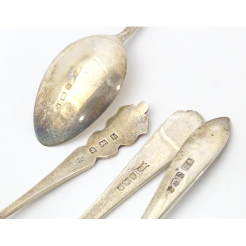 459 - Four assorted silver teaspoons, together with a silver handled fork. Largest approx. 6 1/2