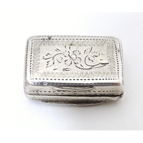 471 - A 19thC silver vinaigrette with engraved decoration opening to reveal gilded interior and grille, ha... 