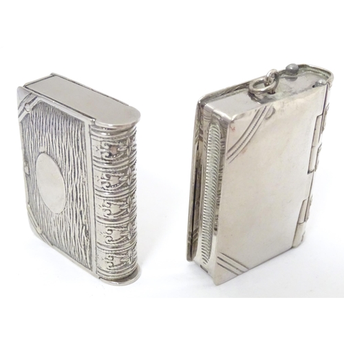 482 - Two silver plate vesta cases modelled as books. Approx. 2