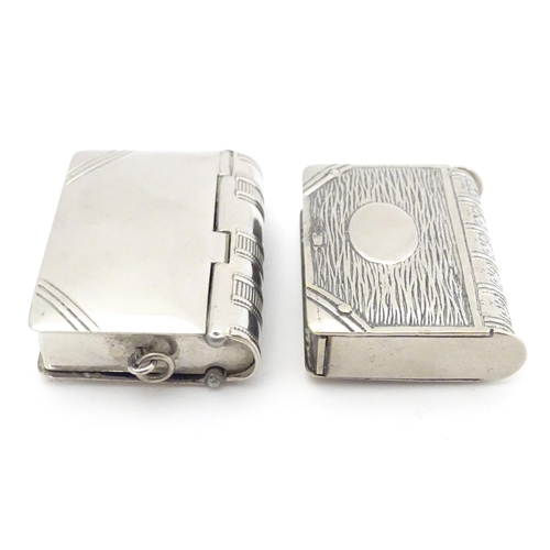 482 - Two silver plate vesta cases modelled as books. Approx. 2