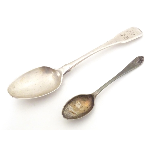 484 - A Geo III silver Fiddle pattern teaspoon hallmarked London 1810, maker S. A. Together with a silver ... 