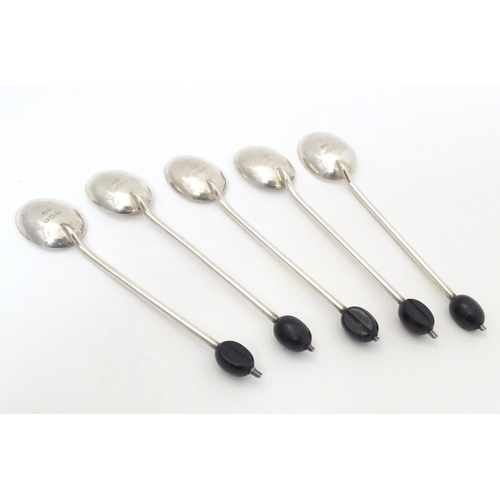 493 - Five coffee spoons with coffee bean decoration, hallmarked Birmingham 1923, maker J. S. Approx. 4 1/... 