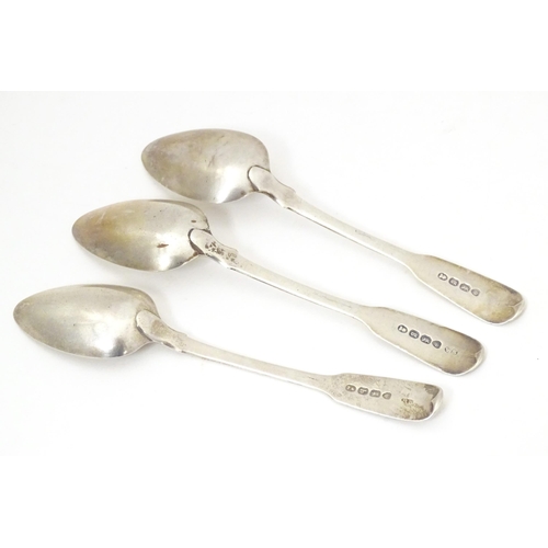 507 - Three Geo IV silver Fiddle pattern teaspoons comprising two hallmarked London 1822, maker W. S. and ... 