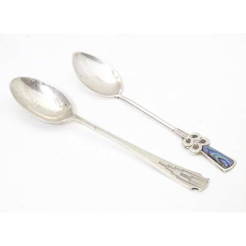 513 - An Art Deco teaspoon hallmarked Sheffield 1932, maker Charles James Allen. Together with a silver te... 