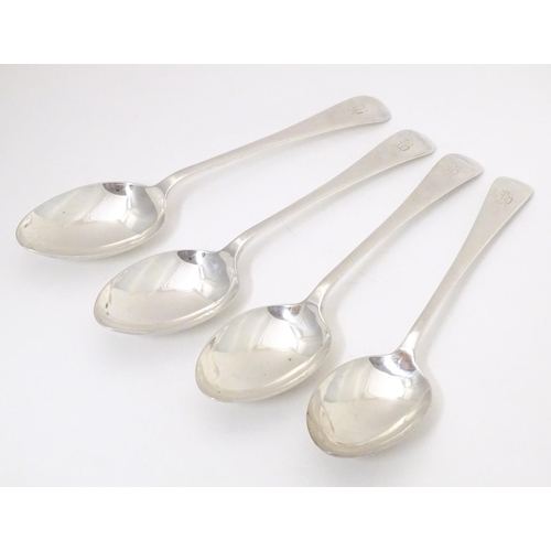 340 - A set of four silver table spoons hallmarked London 1934, maker Kemp Brothers. Approx. 8 1/2