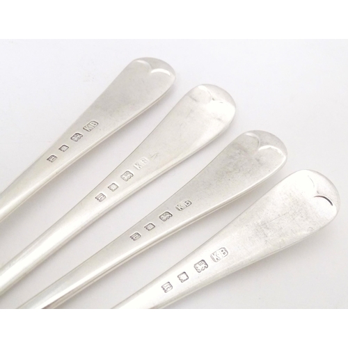 340 - A set of four silver table spoons hallmarked London 1934, maker Kemp Brothers. Approx. 8 1/2