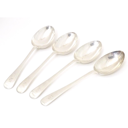 340 - A set of four silver table spoons hallmarked London 1934, maker Kemp Brothers. Approx. 8 1/2