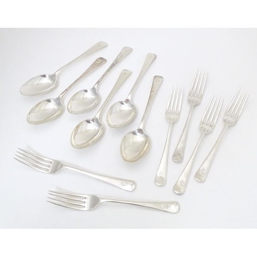 342 - A set of six silver forks, together with a set of six silver spoons, all hallmarked London 1936, mak... 