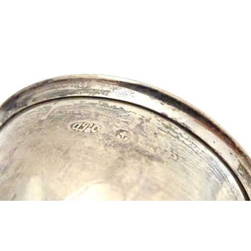 343 - A silver egg cup and spoon, hallmarked Birmingham 1939, maker Arthur Price & Co, cased. The case app... 