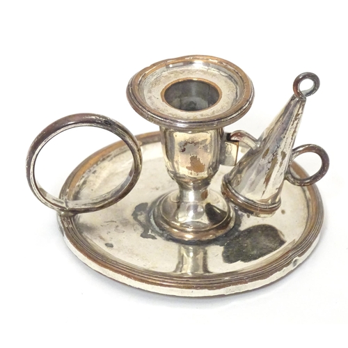 345 - A 19thC silver plate small chamberstick / taper stick holder with snuffer. Approx. 1 3/4