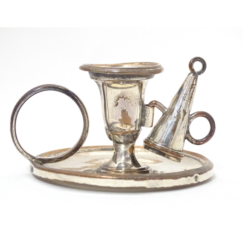 345 - A 19thC silver plate small chamberstick / taper stick holder with snuffer. Approx. 1 3/4