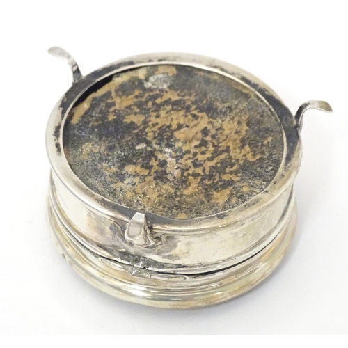 361 - A silver ring box of circular form on three outswept feet. Hallmarked Birmingham 1911. Approx. 2 1/2... 