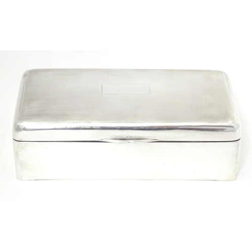 367 - A silver cigarette box of rectangular form, hallmarked Birmingham 1931, maker Wilmot Manufacturing C... 