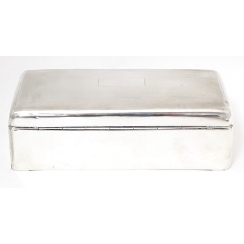 367 - A silver cigarette box of rectangular form, hallmarked Birmingham 1931, maker Wilmot Manufacturing C... 