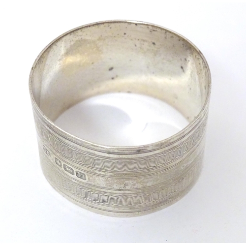 369 - Three various silver napkin rings hallmarked London 1897, maker WRC, Sheffield 1914, maker Levesley ... 