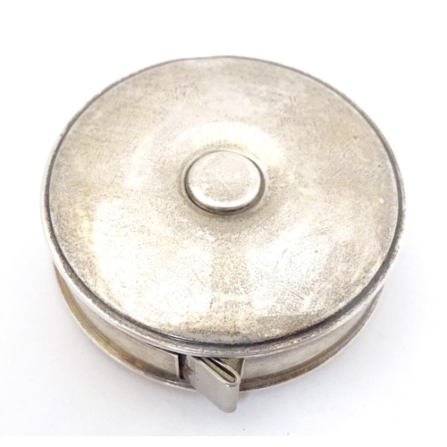 370 - A Continental silver cased tape measure Approx. 2