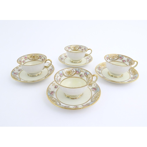 63 - A quantity of Japanese Noritake tea wares with banded decoration depicting roses with gilt highlight... 