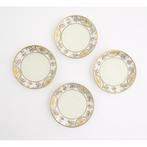 63 - A quantity of Japanese Noritake tea wares with banded decoration depicting roses with gilt highlight... 