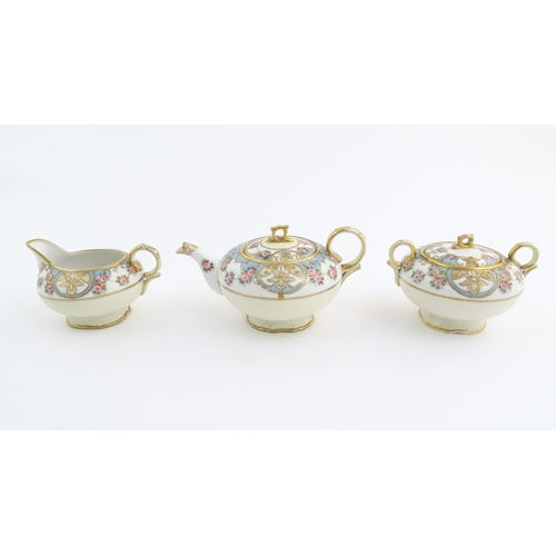 63 - A quantity of Japanese Noritake tea wares with banded decoration depicting roses with gilt highlight... 