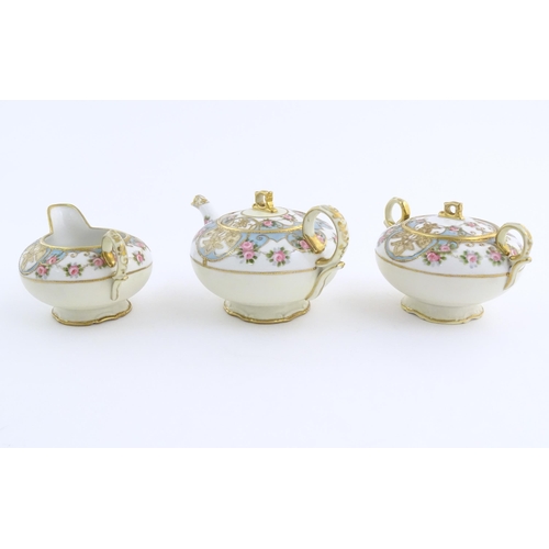 63 - A quantity of Japanese Noritake tea wares with banded decoration depicting roses with gilt highlight... 