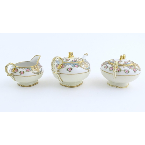 63 - A quantity of Japanese Noritake tea wares with banded decoration depicting roses with gilt highlight... 