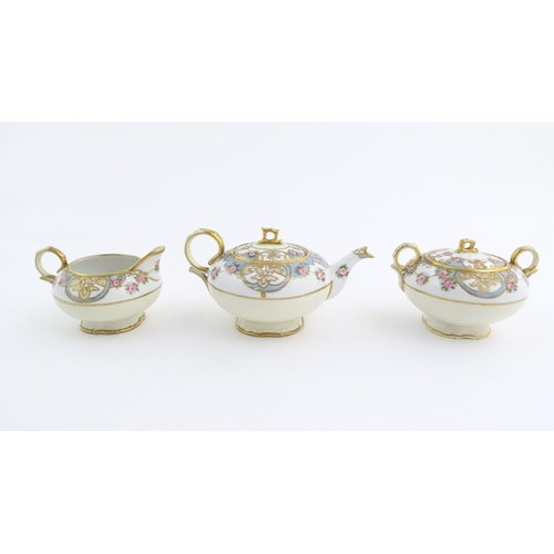 63 - A quantity of Japanese Noritake tea wares with banded decoration depicting roses with gilt highlight... 