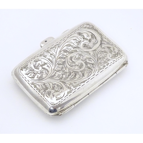 292 - A silver cigarette case with engraved decoration, hallmarked Birmingham 1919, maker Joseph Gloster L... 