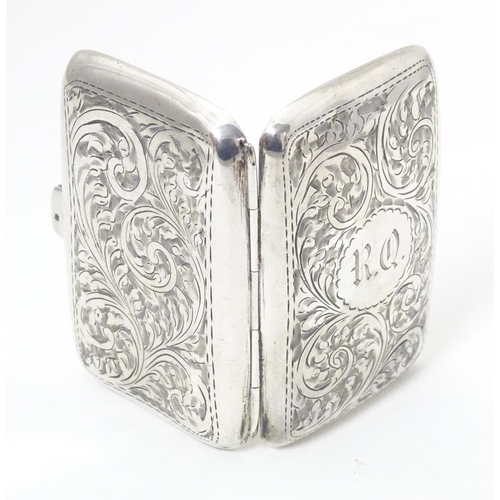 292 - A silver cigarette case with engraved decoration, hallmarked Birmingham 1919, maker Joseph Gloster L... 