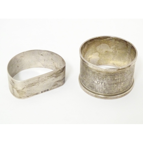 295 - Two silver napkin rings, one hallmarked Birmingham 1947, maker B & Co., the other hallmarked Chester... 