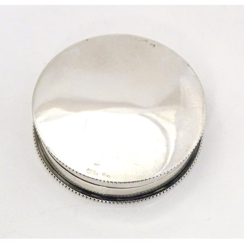 296 - A Victorian silver pill box of circular form with gilded interior, hallmarked Birmingham 1897, maker... 